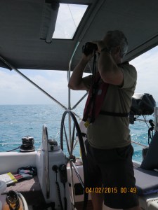 Captain checking out the entrance to the marina at Highbourne Cay