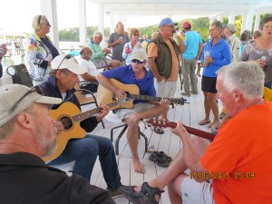 Sunday we have pot luck happy hour by the pool and some of the guys, including Guy (Miss Ellie) play guitar to entertain the group