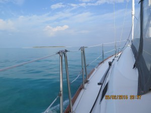 Calm day with distant thunder clouds as we leave to make the Whale Cay ocean passage