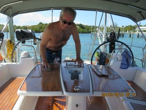 Captain working hard refinishing the table