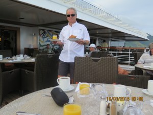 Enjoying breakfast outside on the deck -- loves the coissants