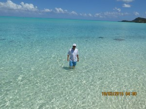 Randy in the clear clean water of the beach on Bora Bora