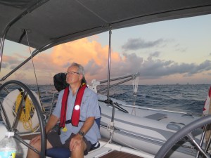 Captain navigating the heavy seas and darkness.